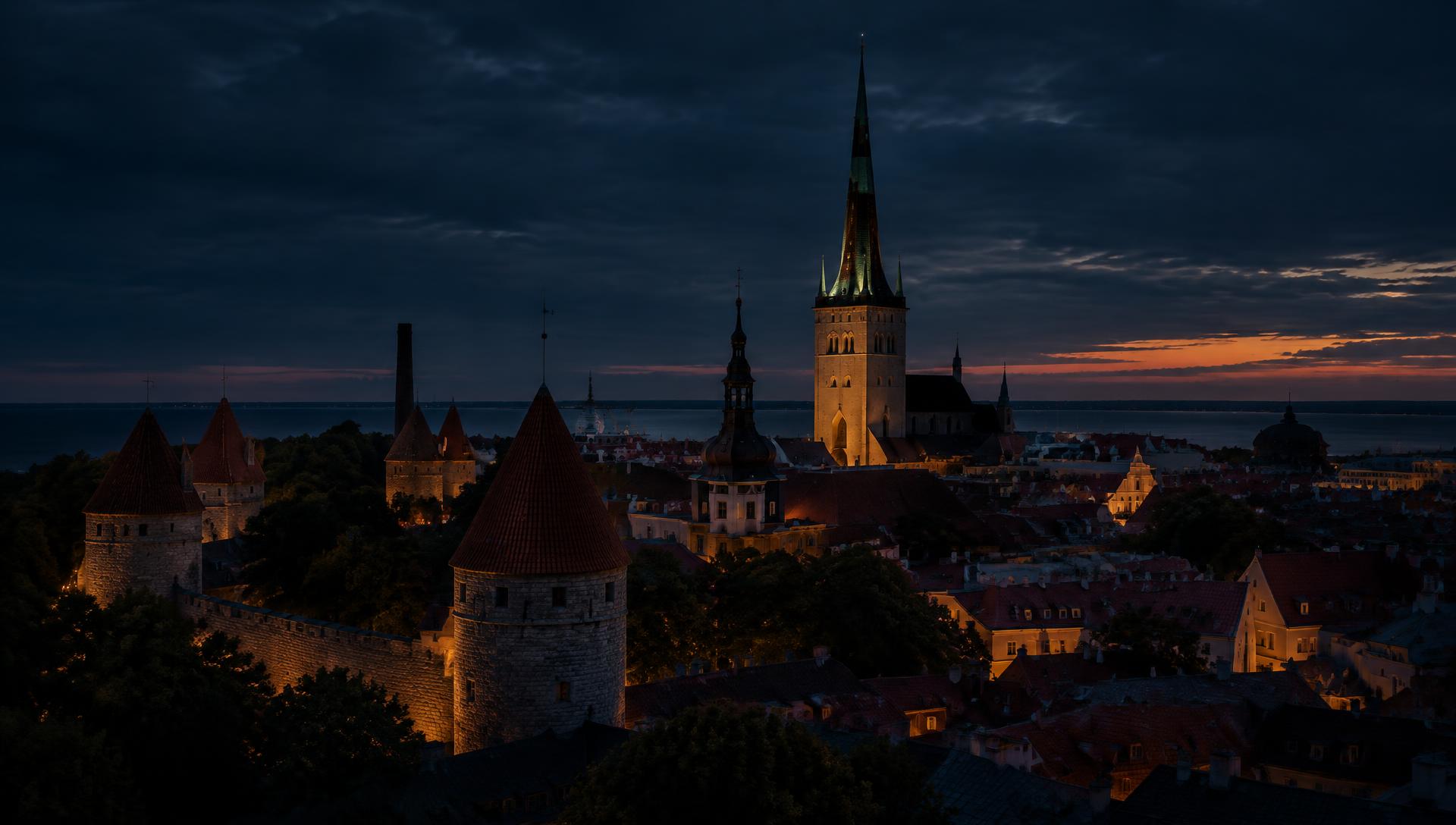 Tallinn Old Town and Oleviste church at dusk